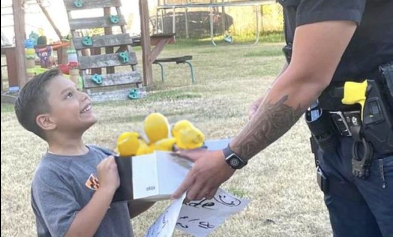 Police Officer Surprises 7-Year-Old Boy Selling Lemonade With A Pair Of Brand New Sneakers For School