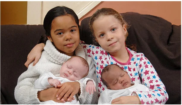 A family gifted with rare black & white twins receive the same blessing 7 years later