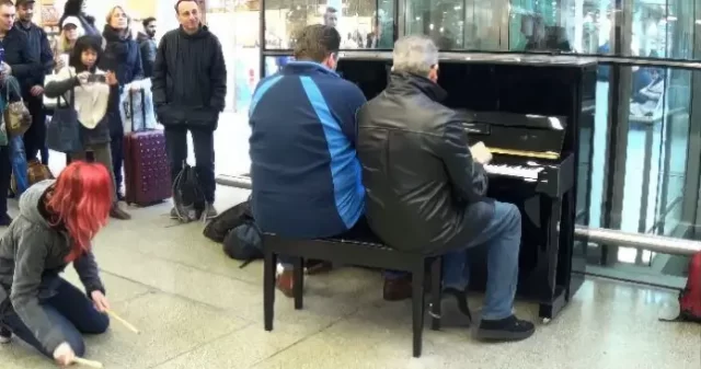 2 Men Were Playing Boogie on a Public Piano When a Red Haired Drummer Steps In…