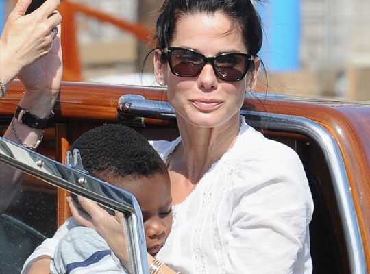 Sandra Bullock says Keanu Reeves brought her champagne and truffles more than 20 years ago