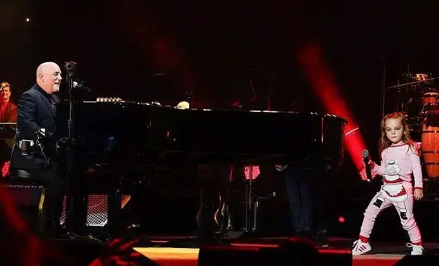 Billy Joel’s 3-Yr-Old Daughter Steals the Show On Stage With Dad