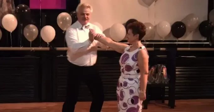 He Holds Her Hand for a Dance but Their Next Move Has the Crowd Cheering