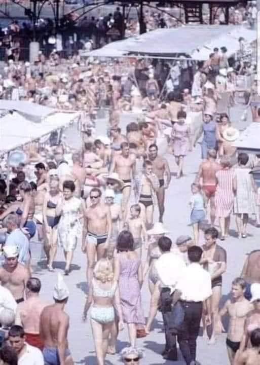 A beach in the 70’s. Not one over weight body. My, how the food industry destroyed us.